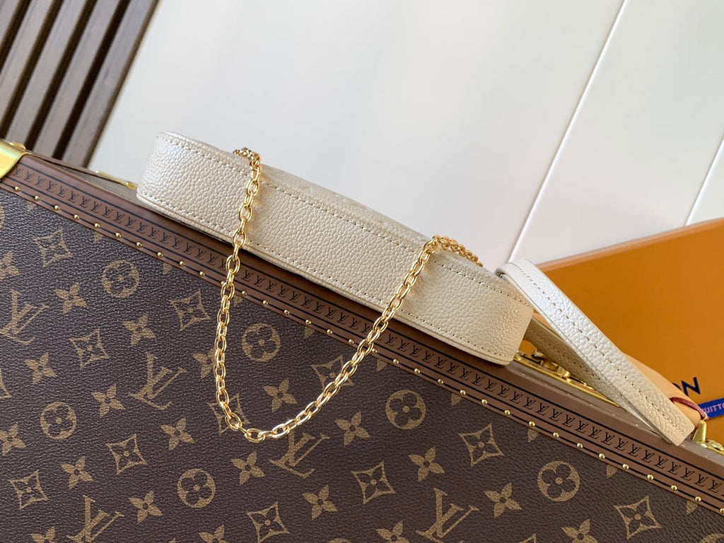 EASY POUCH ON STRAP 19 IN BEIGE MONOGRAM EMPREINTE LEATHER