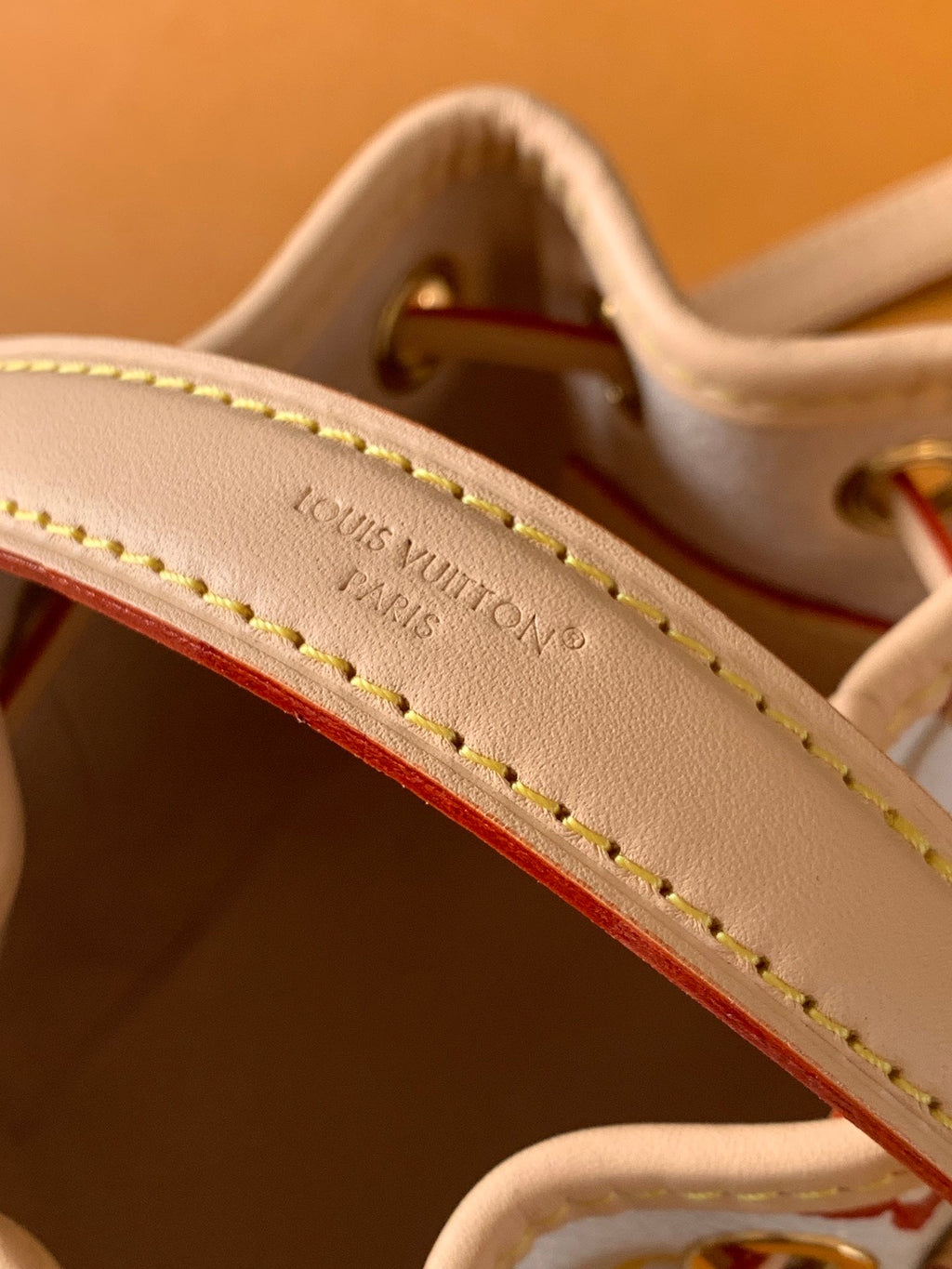 LV 26S NANO NOÉ 16 IN WHITE COATED CANVAS