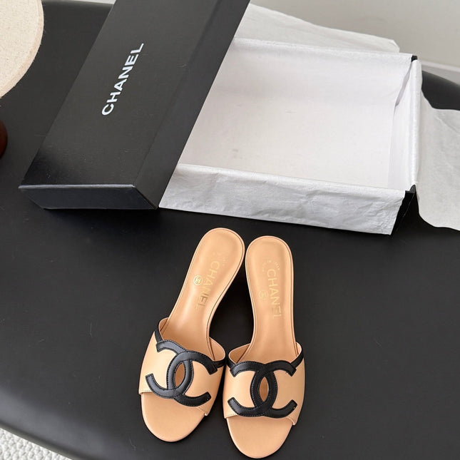 CHANEL MULES IN BEIGE AND BLACK CALFSKIN