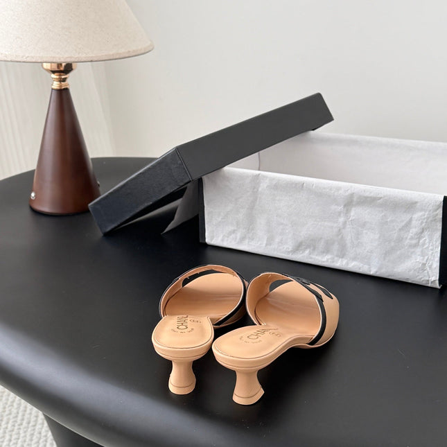 CHANEL MULES IN BEIGE AND BLACK CALFSKIN
