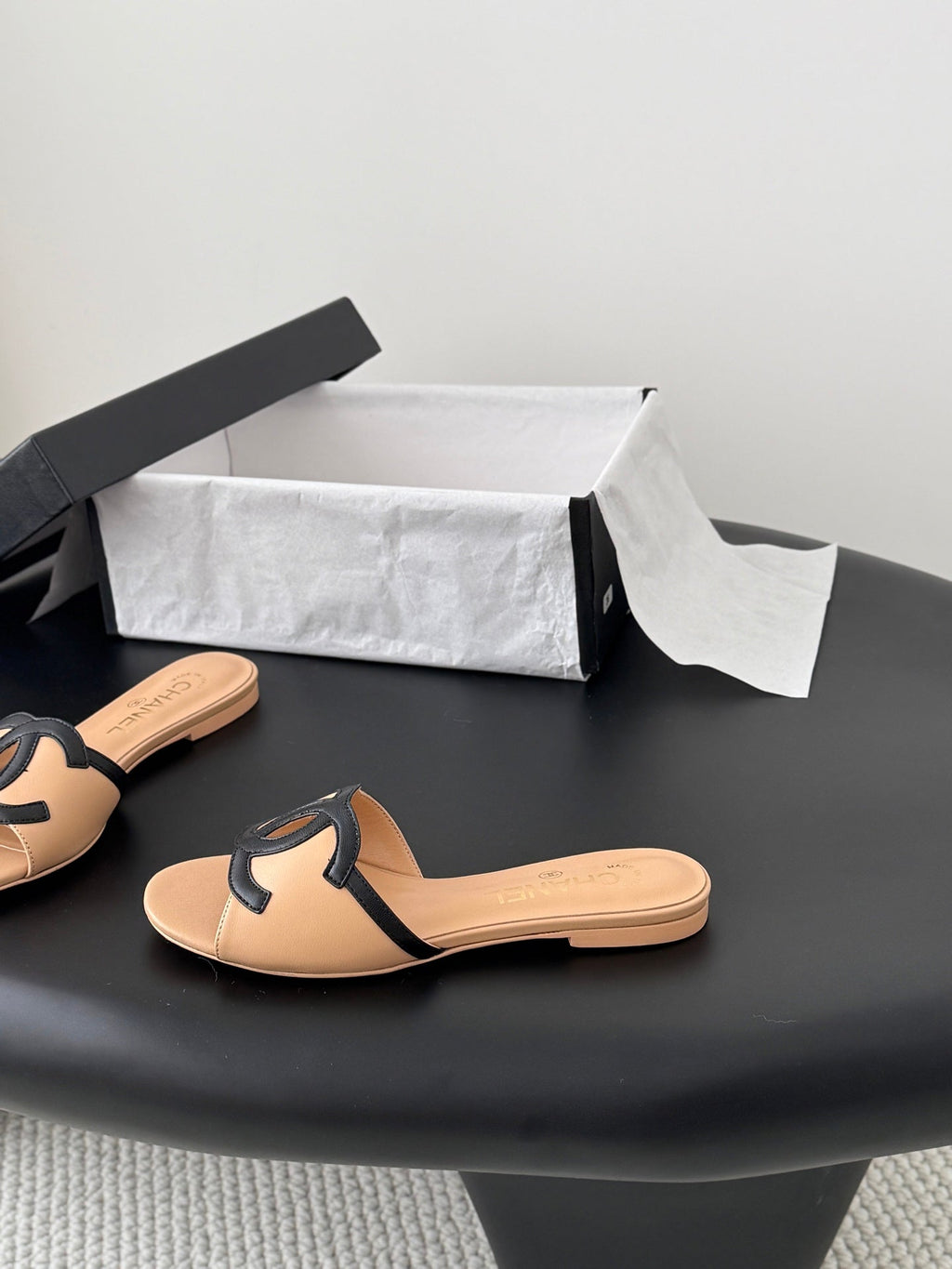 CHANEL MULES IN BEIGE MIX BLACK CALFSKIN