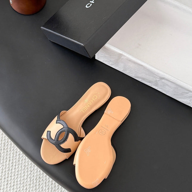 CHANEL MULES IN BEIGE MIX BLACK CALFSKIN