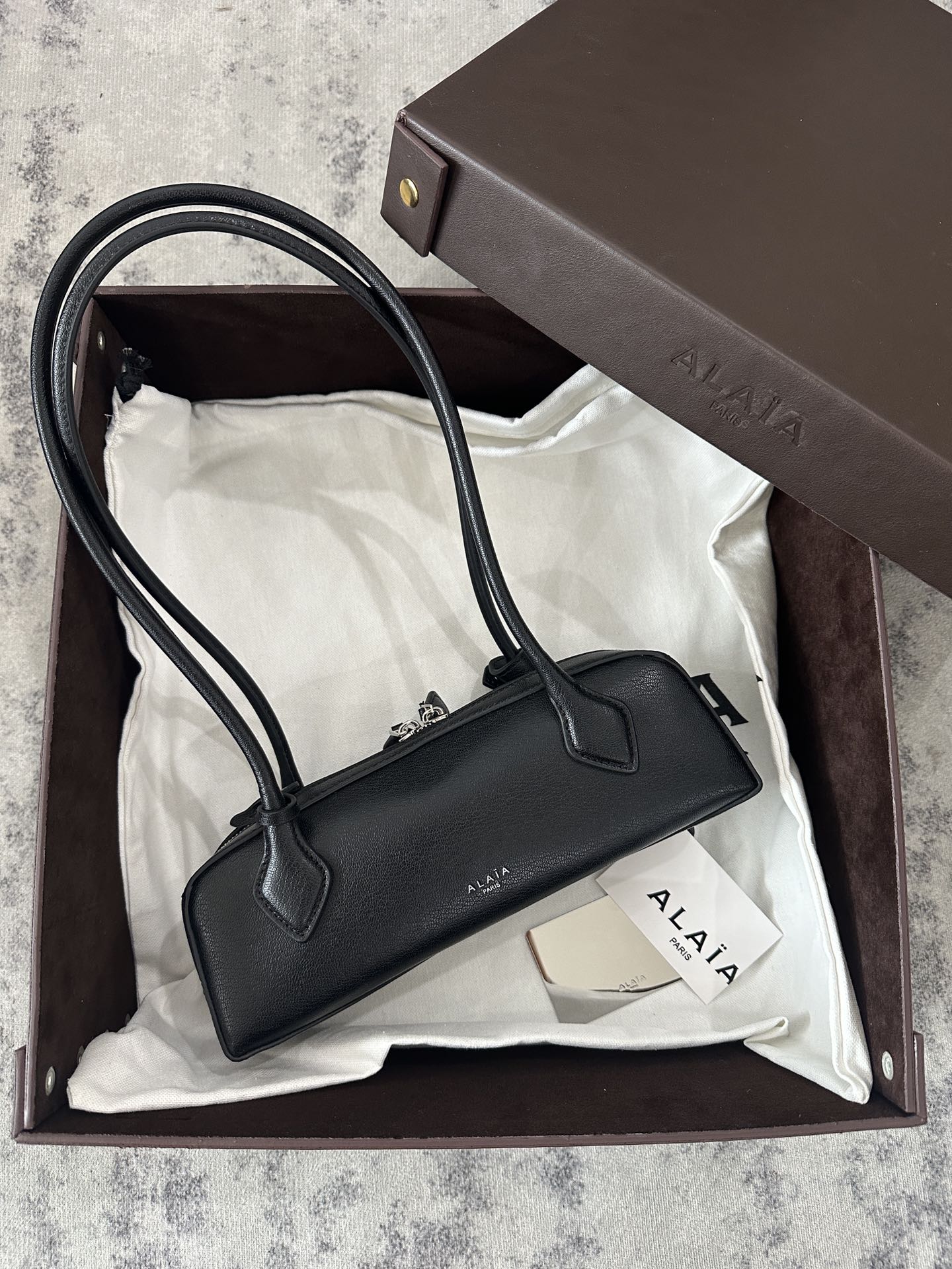 LE TECKEL SMALL BAG 27 IN BLACK GOATSKIN