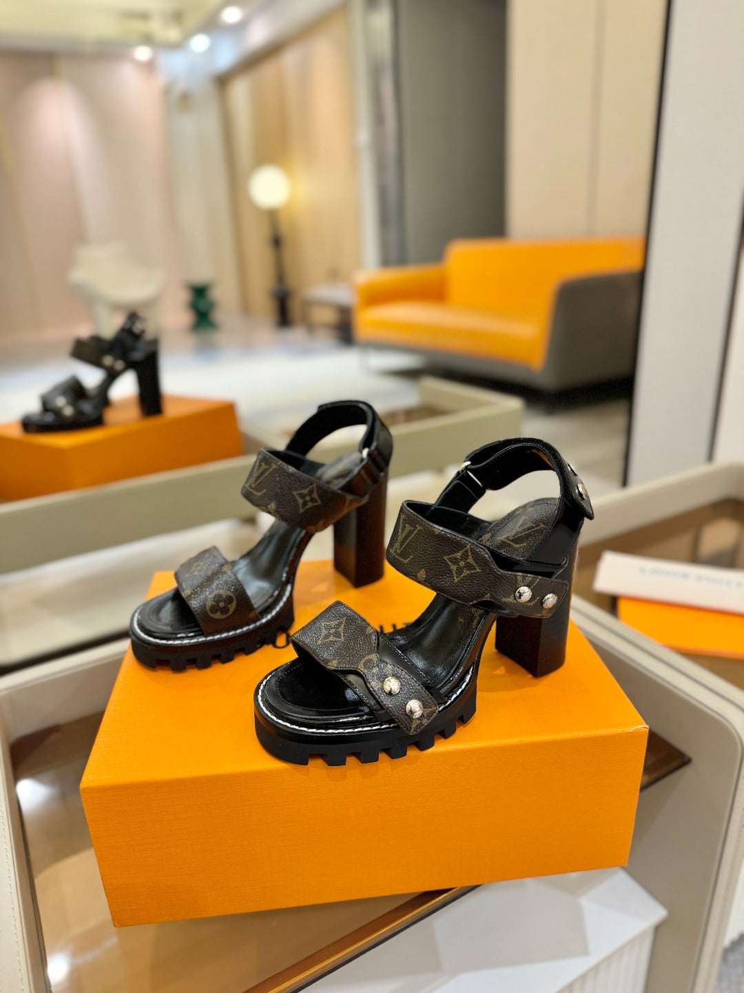 LV 26S HIGH HEEL SANDALS 100 MM IN DARK BROWN AND BLACK CALFSKIN