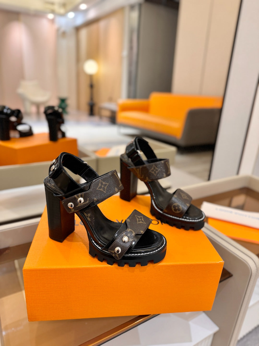 LV 26S HIGH HEEL SANDALS 100 MM IN DARK BROWN AND BLACK CALFSKIN
