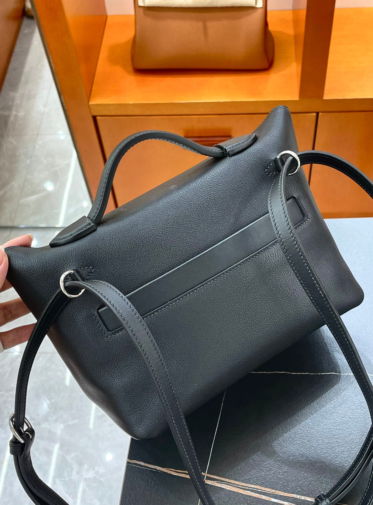 MINI 24/24 21CM IN BLACK EVERCOLOR CALFSKIN SILVER KELLY BUCKLE