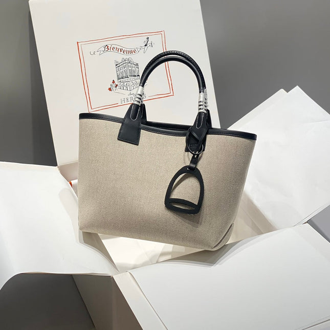 STEEPLE 28 BAG IN OFF-WHITE H CANVAS AND BLACK SWIFT CALFSKIN