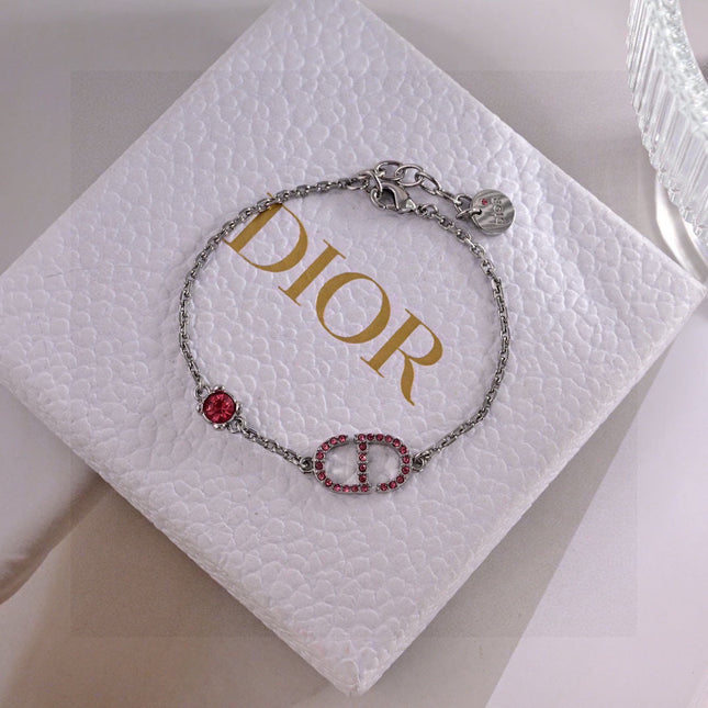 CD 26S PAVE LOGO RED CRYSTAL BRACELET IN SILVER TONE METAL 631790