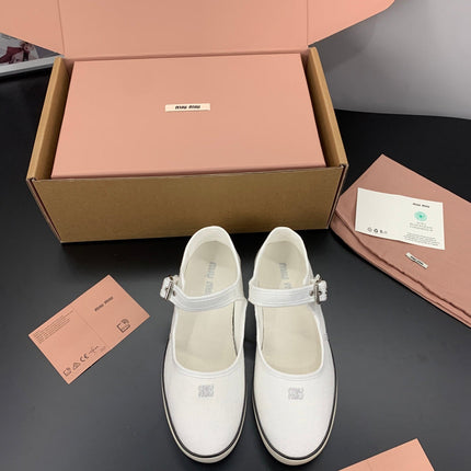 MIUMIU 26S MARY JANE FLATS IN WHITE CANVAS LOGO