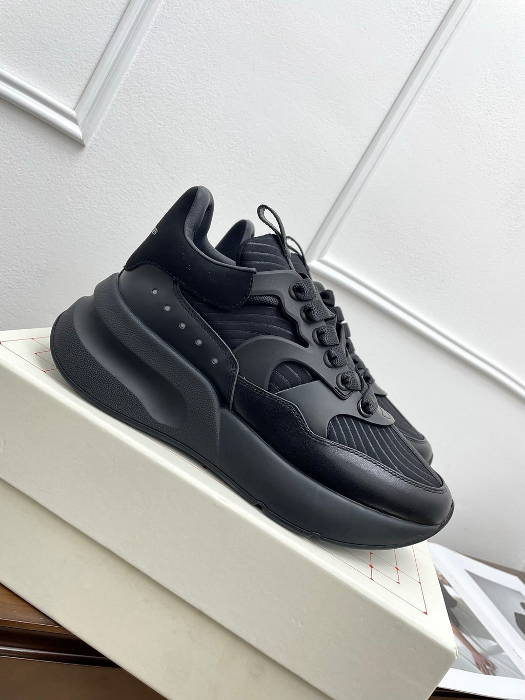 OVERSIZED RUNNER SNEAKERS IN BLACK CALFSKIN AND FABRIC