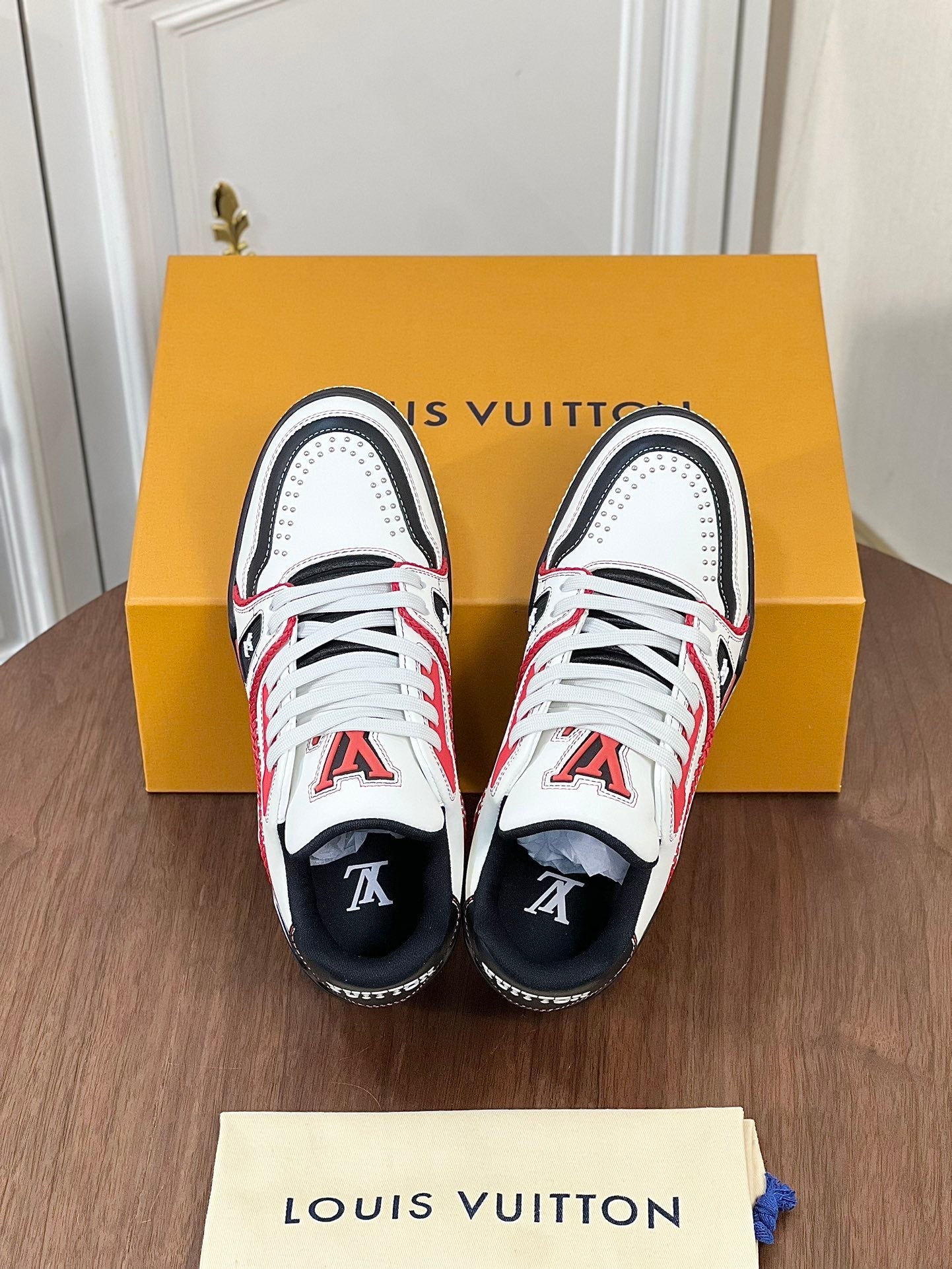 LV TRAINER WHITE MIX BLACK AND RED MONOGRAM CALFSKIN