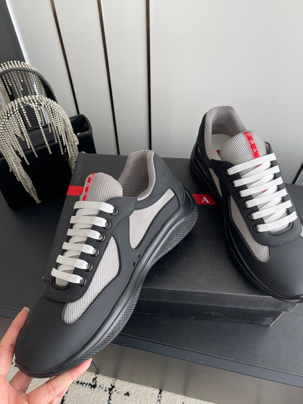 PRADA 26S AMERICA CUP SNEAKERS IN BLACK SOFT RUBBER AND BIKE FABRIC