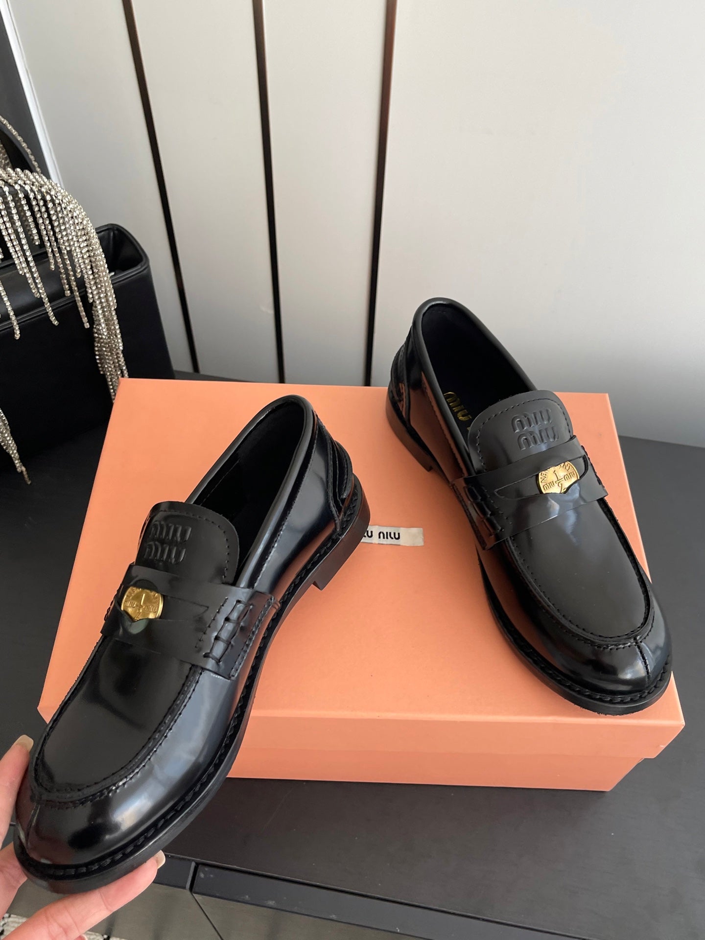 MIUMIU 26S PENNY LOAFERS IN BLACK GLOSSY CALFSKIN GOLD HARDWARE