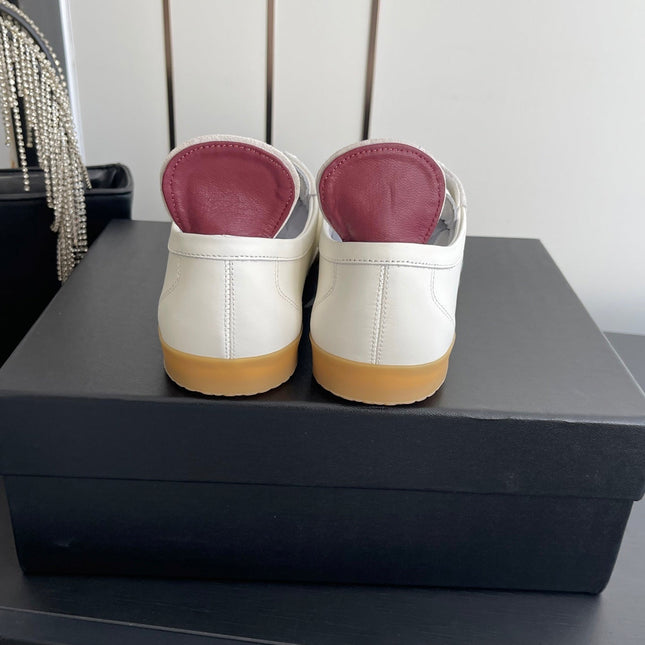 LOW-TOP SNEAKERS IN BLACK AND WHITE CALFSKIN MIX SUEDE