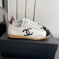 LOW-TOP SNEAKERS IN BLACK AND WHITE CALFSKIN MIX SUEDE
