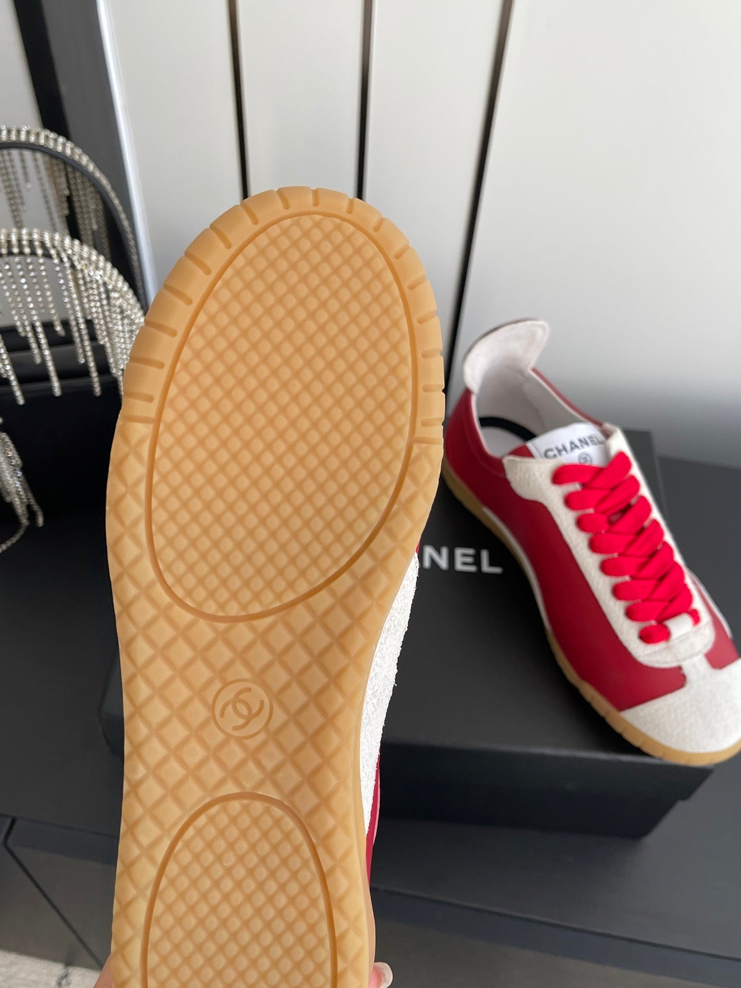 CHANEL LOW-TOP SNEAKERS IN RED CALFSKIN MIX SUEDE