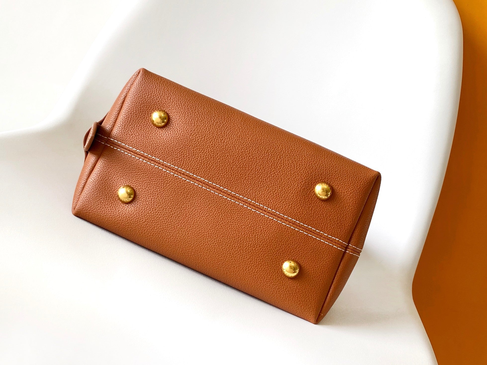 LV 25S LOW KEY HOBO BAG 35 CM IN BURNT ORANGE CALFSKIN