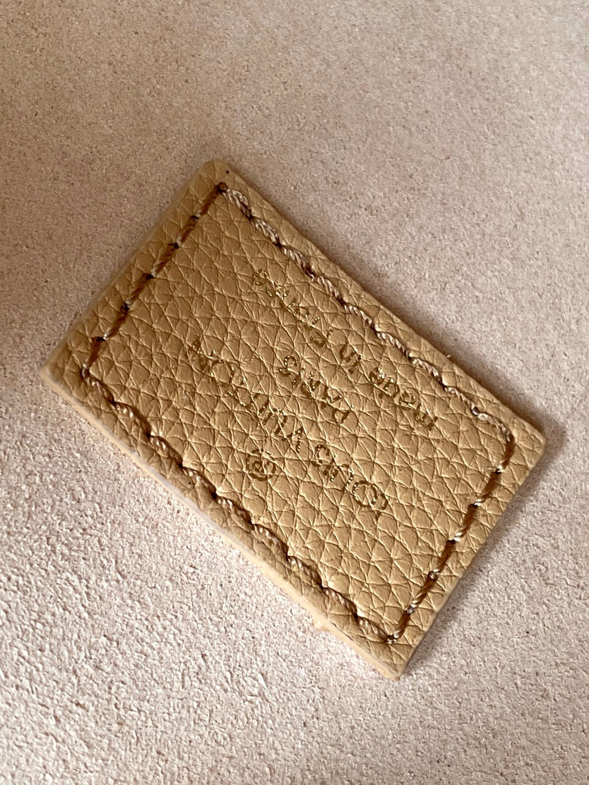 LV 25S LOW KEY HOBO BAG 28 CM IN BEIGE CALFSKIN