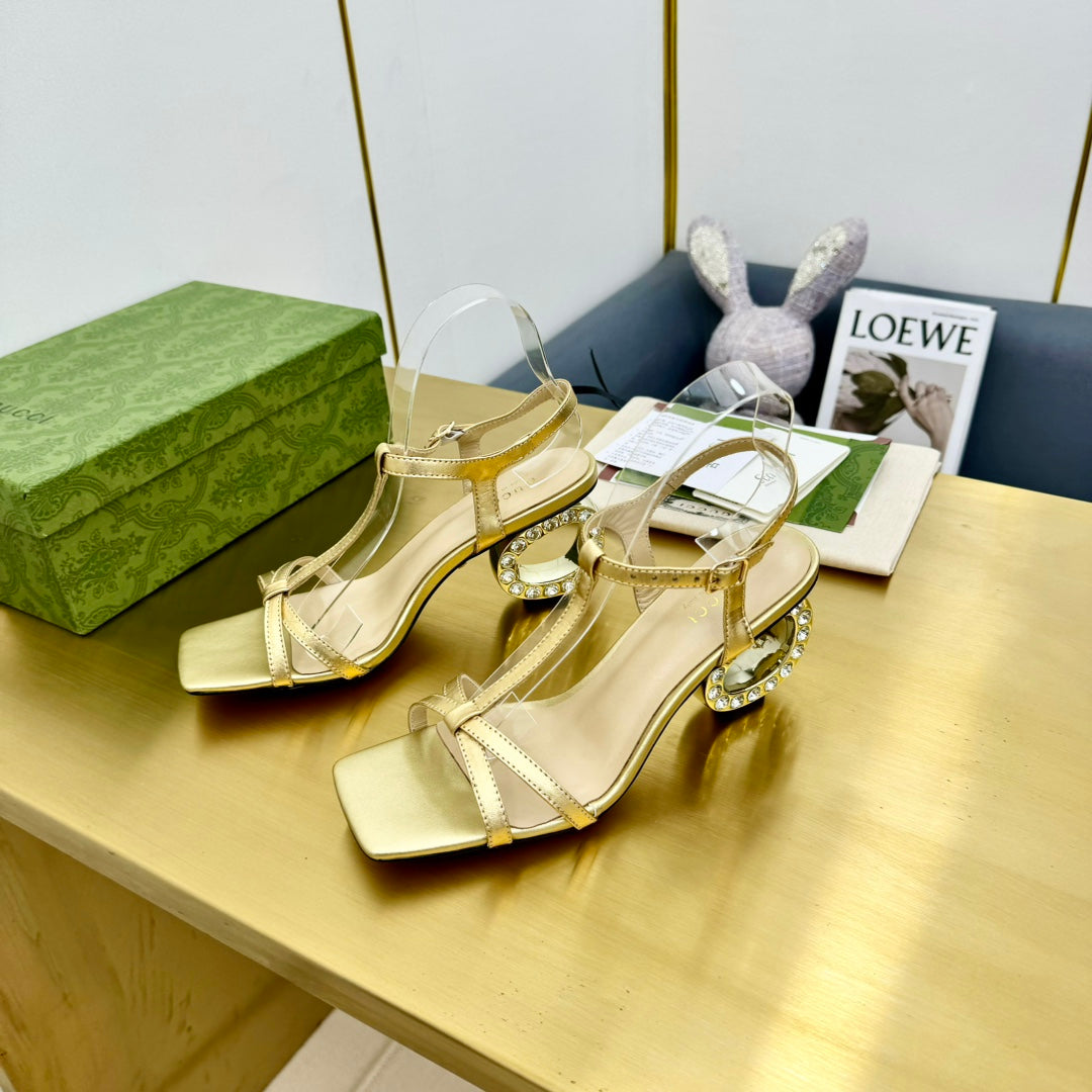 MEDIUM-HEEL SANDAL IN GOLD CALFSKIN GOLD HARDWARE WITH RHINSTONES