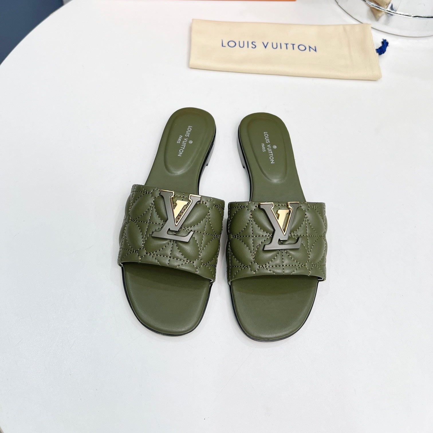 LV 26S MARE FLAT MULES IN MOSS GREEN CALFSKIN