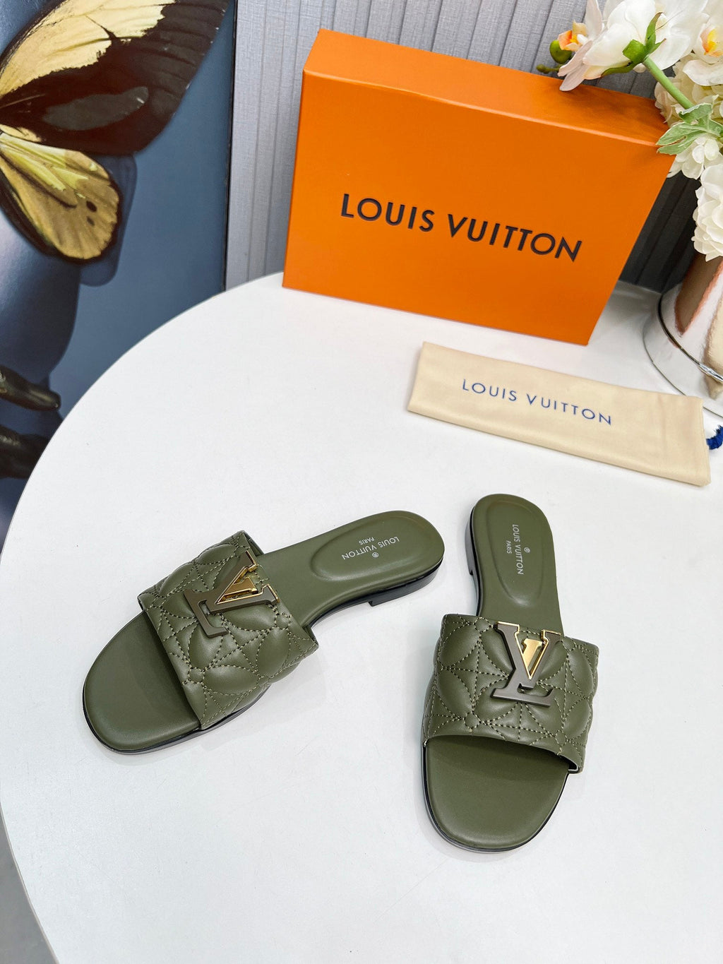 LV 26S MARE FLAT MULES IN MOSS GREEN CALFSKIN