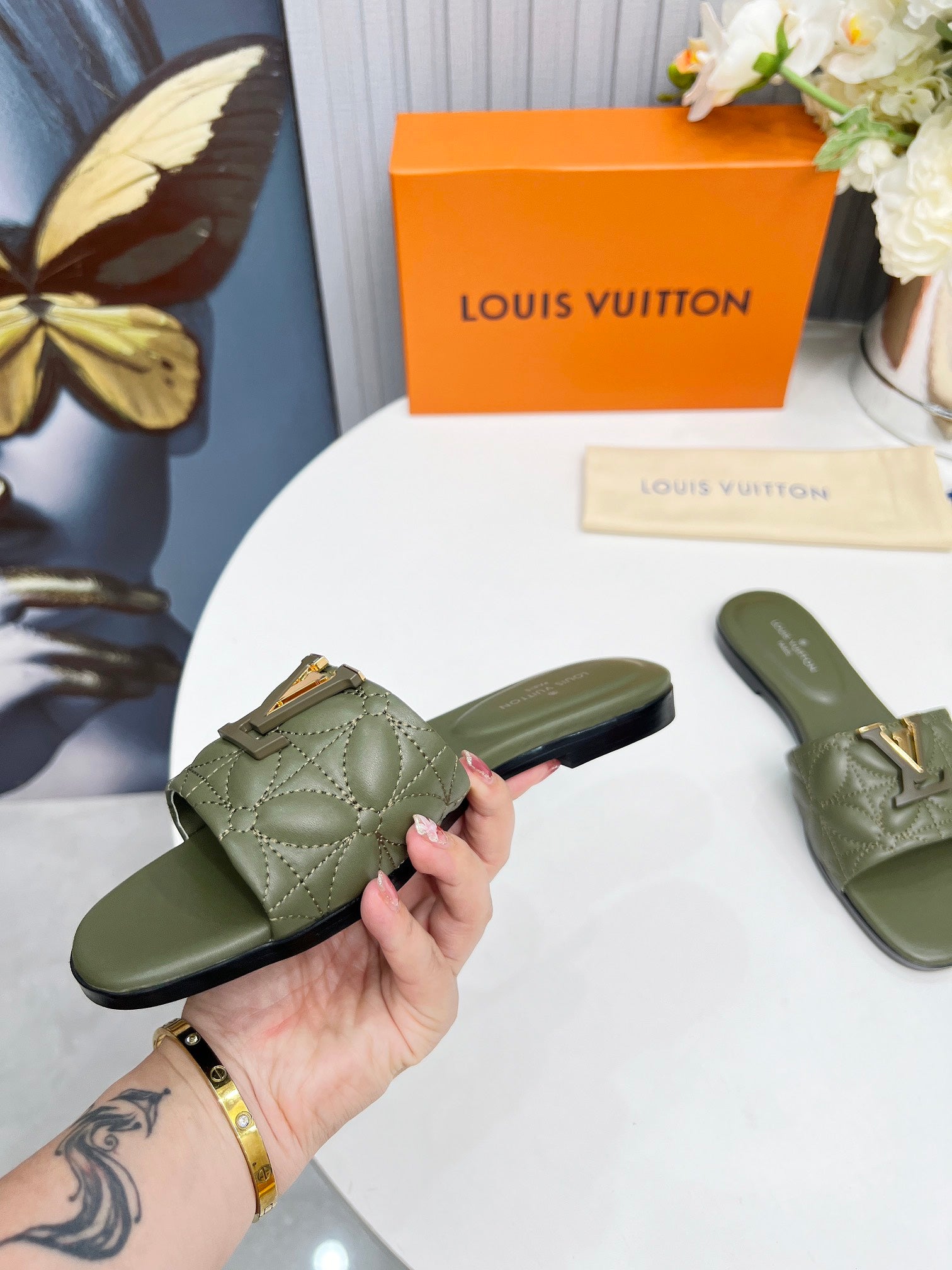 LV 26S MARE FLAT MULES IN MOSS GREEN CALFSKIN