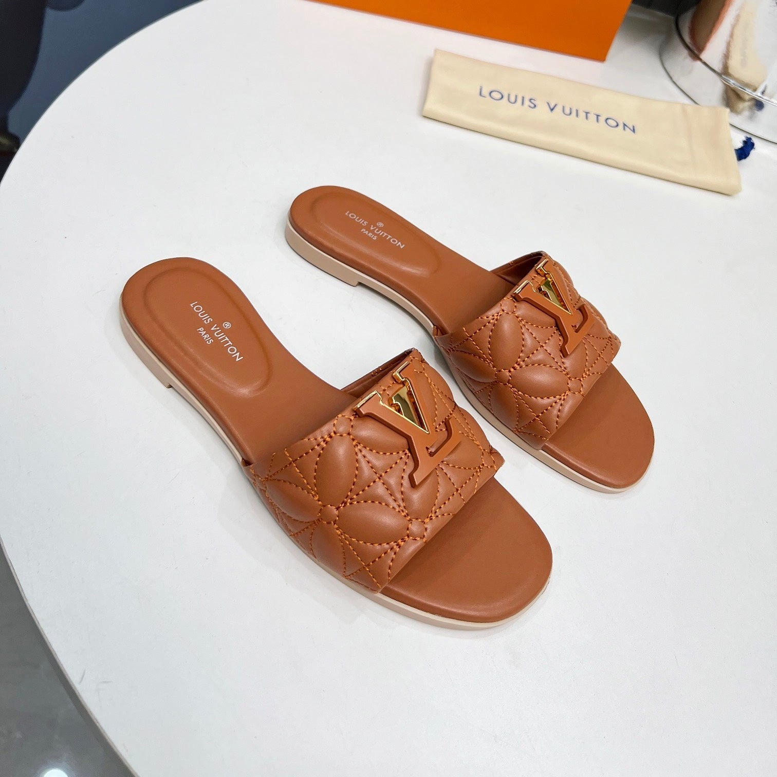 LV 26S MARE FLAT MULES IN BROWN CALFSKIN