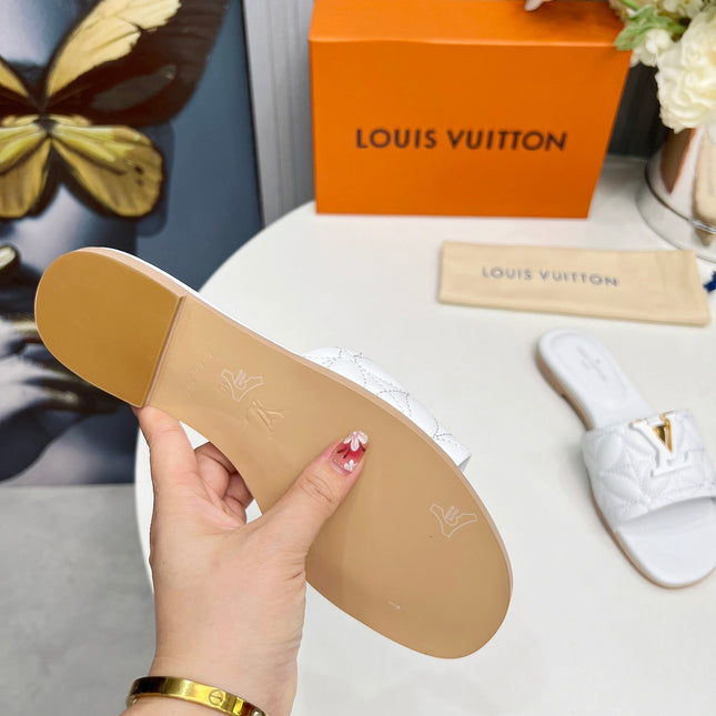 LV 26S MARE FLAT MULES IN WHITE CALFSKIN