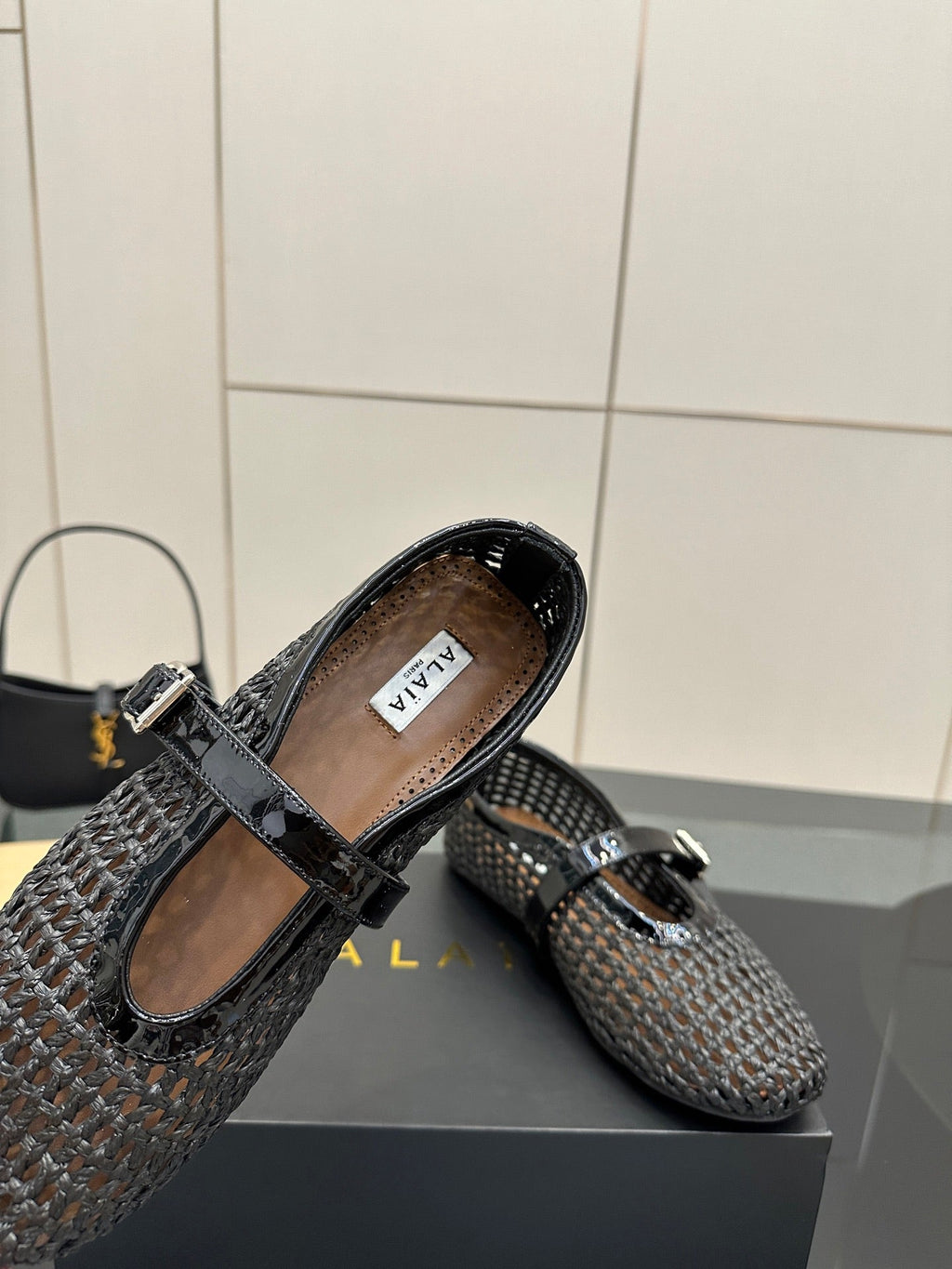 ALAIA MARY JANE FLAT 25S IN BLACK WOVEN MESH