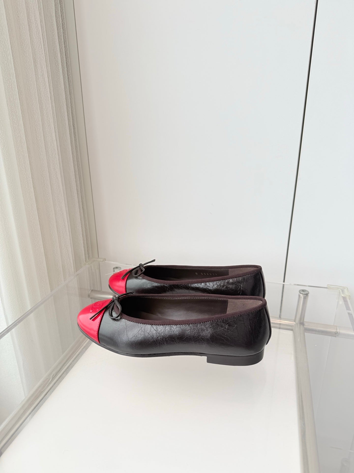 CHANEL 26S BALLET FLATS IN DARK BROWN CALFSKIN WITH RED PATENT TOE CAP & BOW