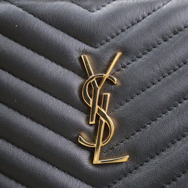 CLUTCH 36 IN BLACK QUILTED CALFSKIN GOLD BUCKLE