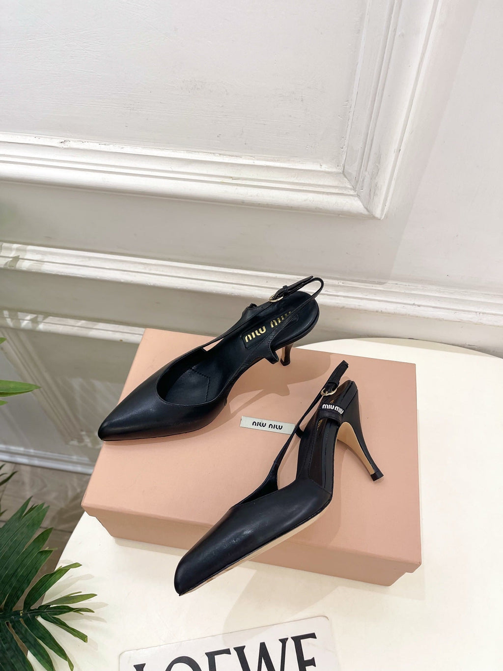 MIUMIU 26S SLINGBACK PUMPS 85MM IN BLACK CALFSKIN