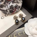 GUCCI 26S DOUBLE G LOGO BLACK CRYSTAL OVAL DROP EARRINGS IN ANTIQUE GOLD TONE METAL 6290262