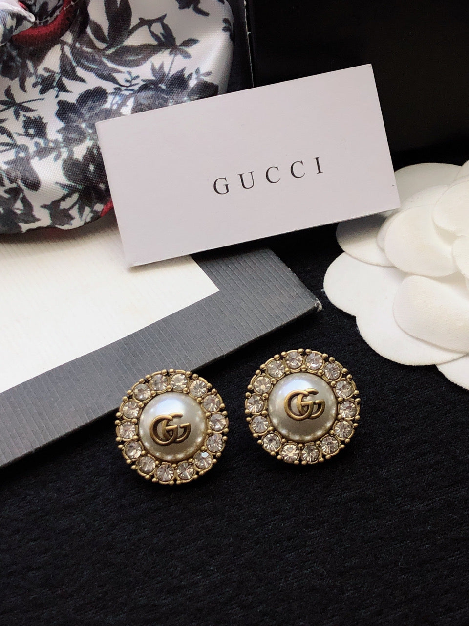GUCCI 26S DOUBLE G LOGO PEARL CRYSTAL HALO STUD EARRINGS IN AGED GOLD TONE METAL 629031