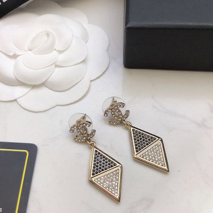 CHANEL 26S DOUBLE C LOGO TWO TONE PAVE CRYSTAL DIAMOND SHAPE DROP EARRINGS IN GOLD METAL 631833
